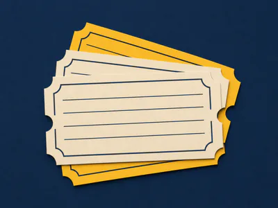 A fanned stack of paper betting tickets cut from cream and canary paper